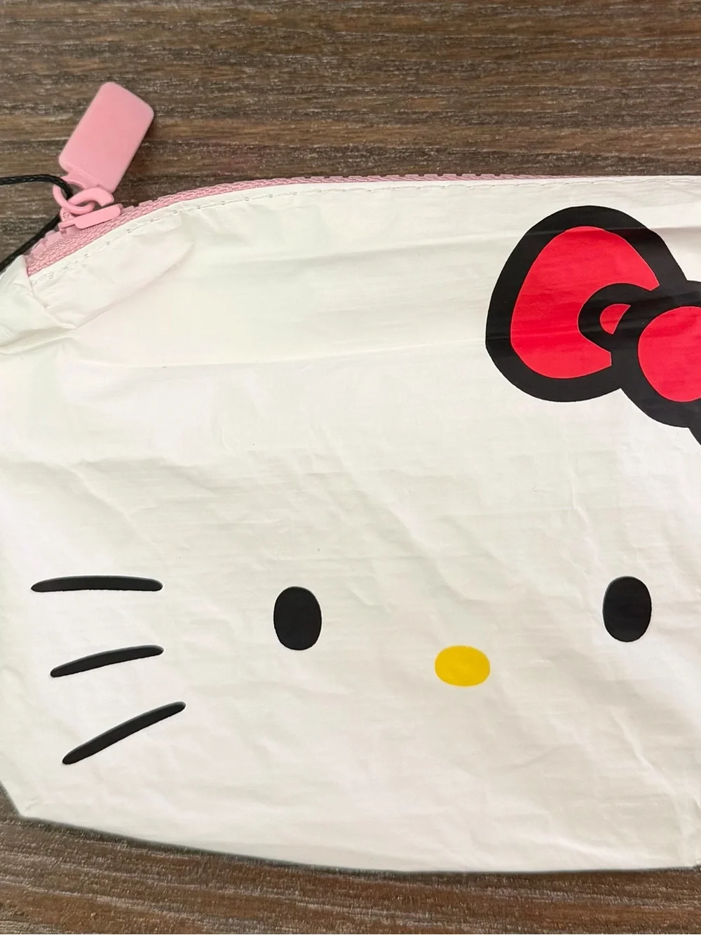 ALOHA Collection White Hello Kitty Face Mini Pouch